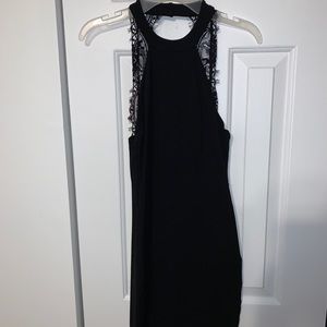 Black dress with lace on the back